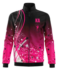 A pink and black rhythmic gymnastics club tracksuit warm-up jacket with stars and a logo on the front.