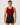 Young male gymnast wearing the Dynamite Isla red sleeveless gymnastics leotard with black shorts