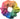 Multicolored scrunchie with a gradient of pink, orange, yellow, green, blue, and purple on a white background.