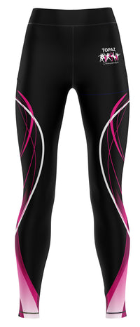 Black full-length athletic leggings with pink and white curved graphic stripes and a small white 'TORAZ' logo on the upper right hip, shown on a plain white background.