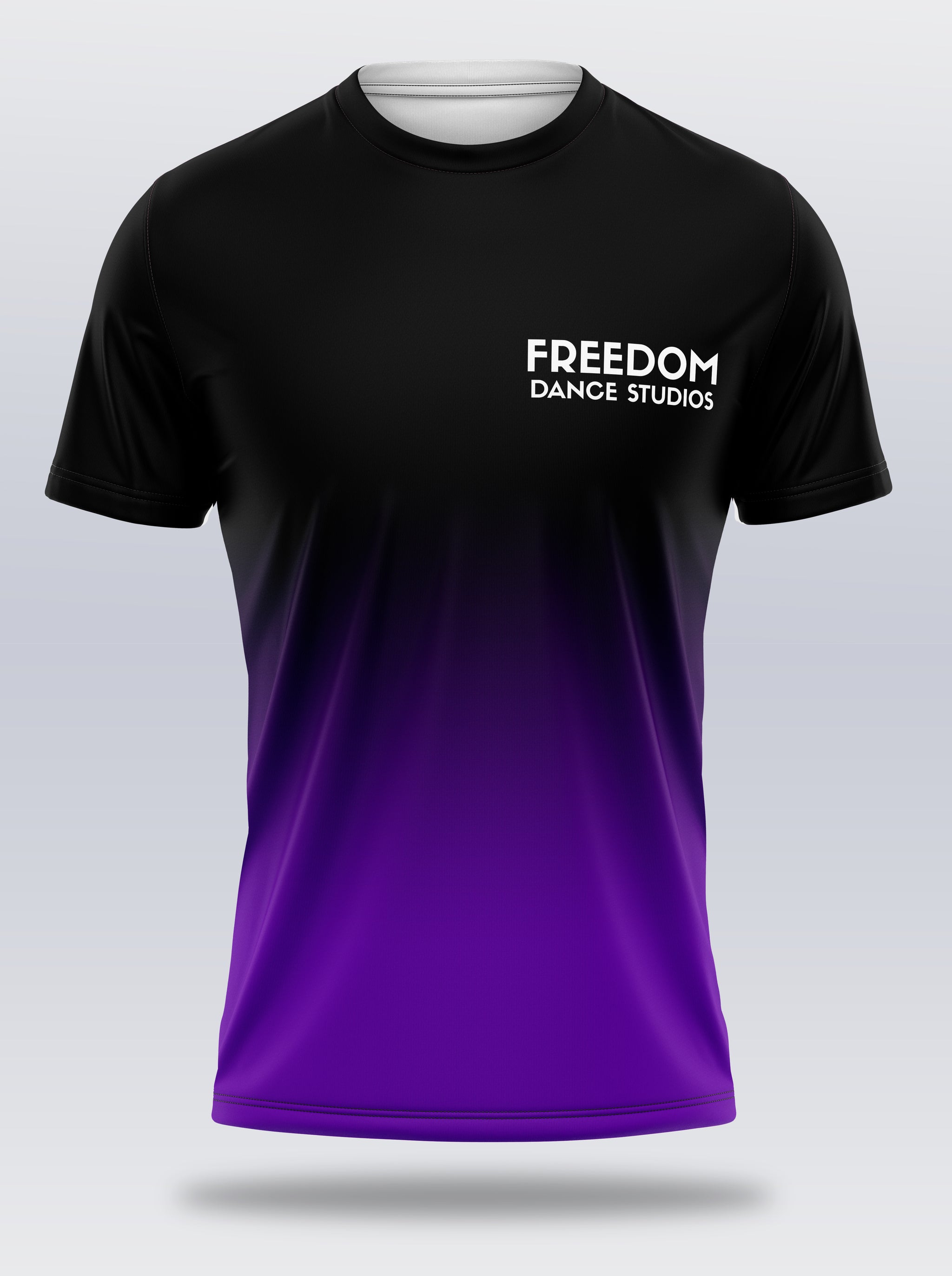 A unisex t-shirt with a black crew neck, featuring a full print design that includes the text 'FREEDOM' and 'Dance Studios' in a gradient of black, light purple, and purple colors.