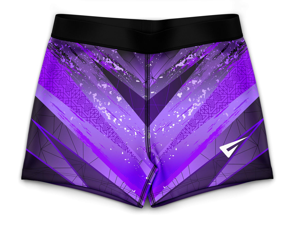 Purple gymnastics shorts lying flat on a white background