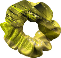 Yellow scrunchie with geometric pattern on a white background
